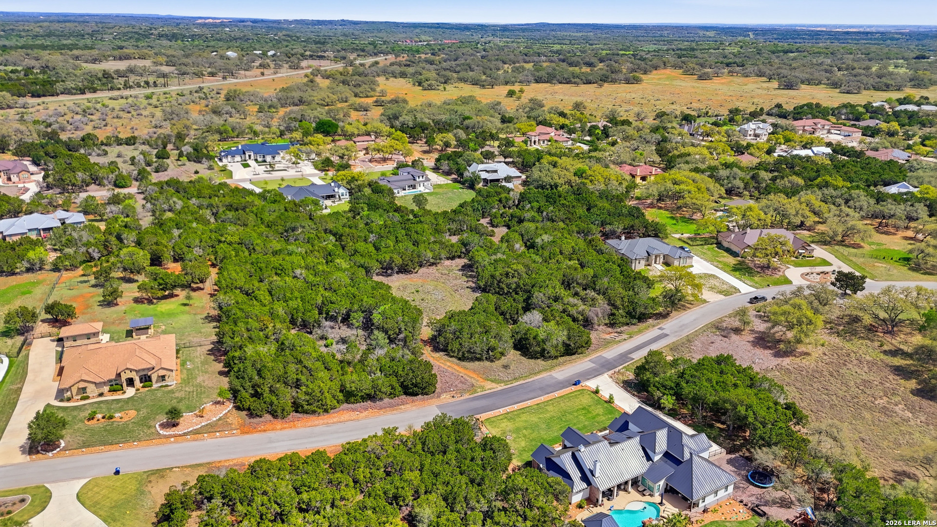 27230 Eichenbaum Road New Braunfels, TX 78132 - Photo 29 of 38 an aerial view of residential houses with outdoor space