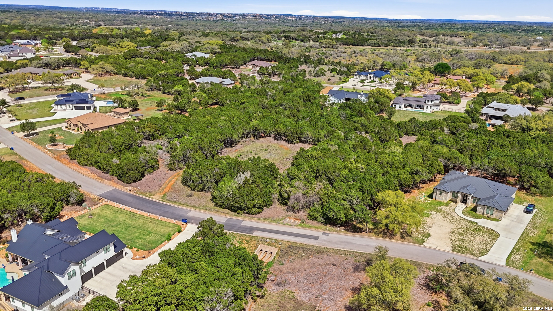 27230 Eichenbaum Road New Braunfels, TX 78132 - Photo 34 of 38 an aerial view of residential houses with outdoor space