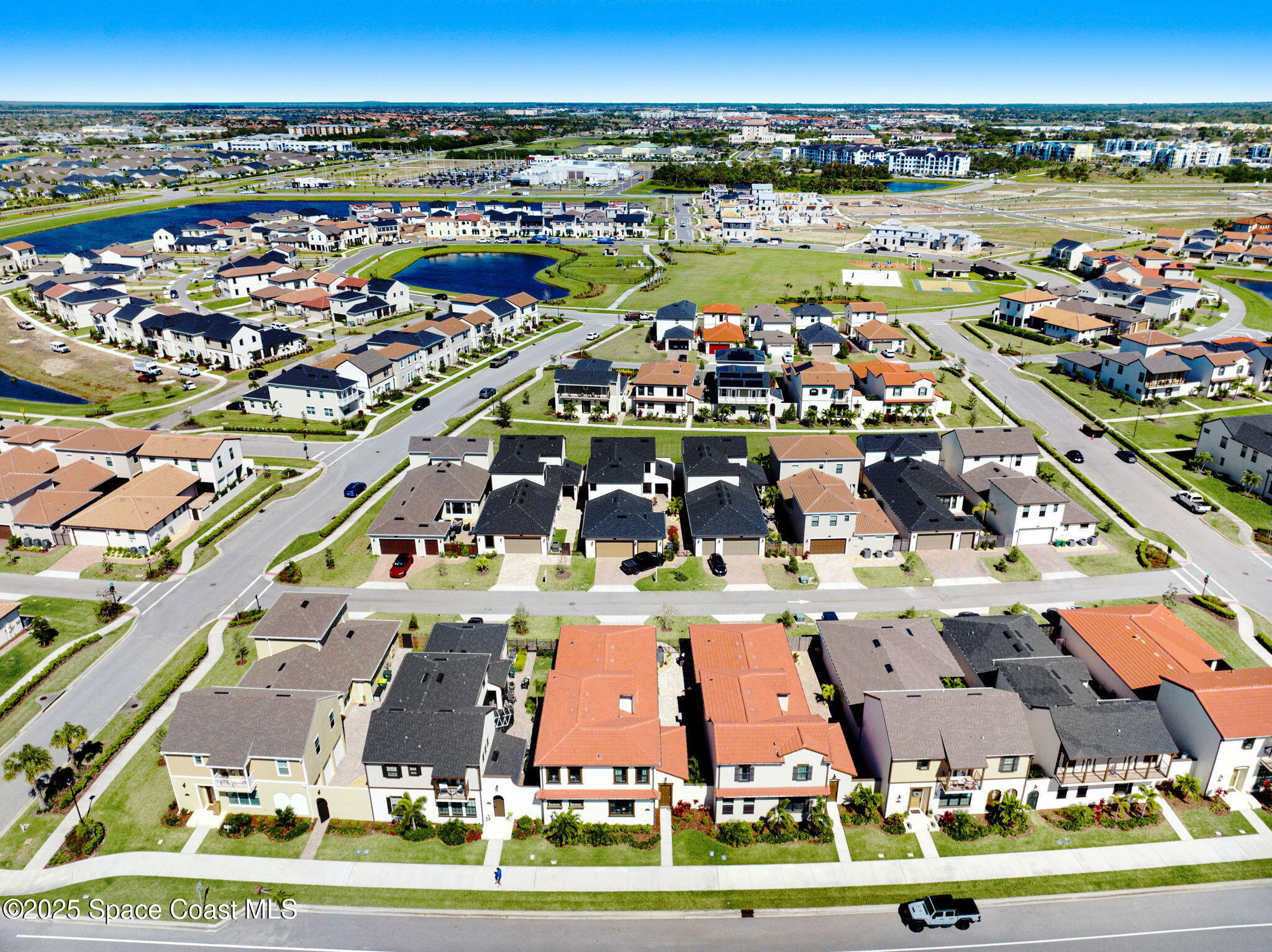 2366 Addison Drive Melbourne, FL 32940 - Photo 13 of 43 an aerial view of residential building with parking space
