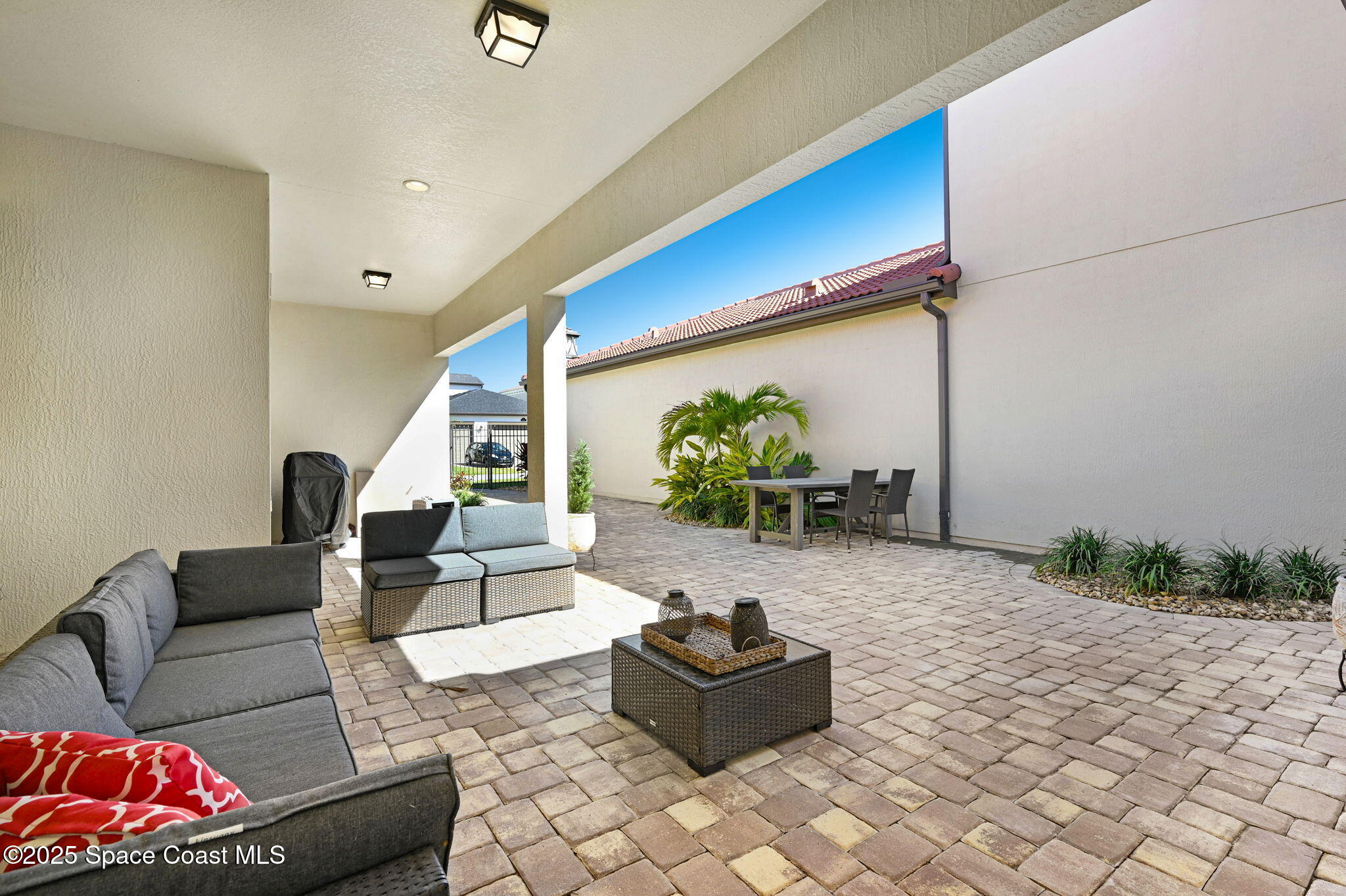 2366 Addison Drive Melbourne, FL 32940 - Photo 17 of 43 a living room with furniture and a potted plant