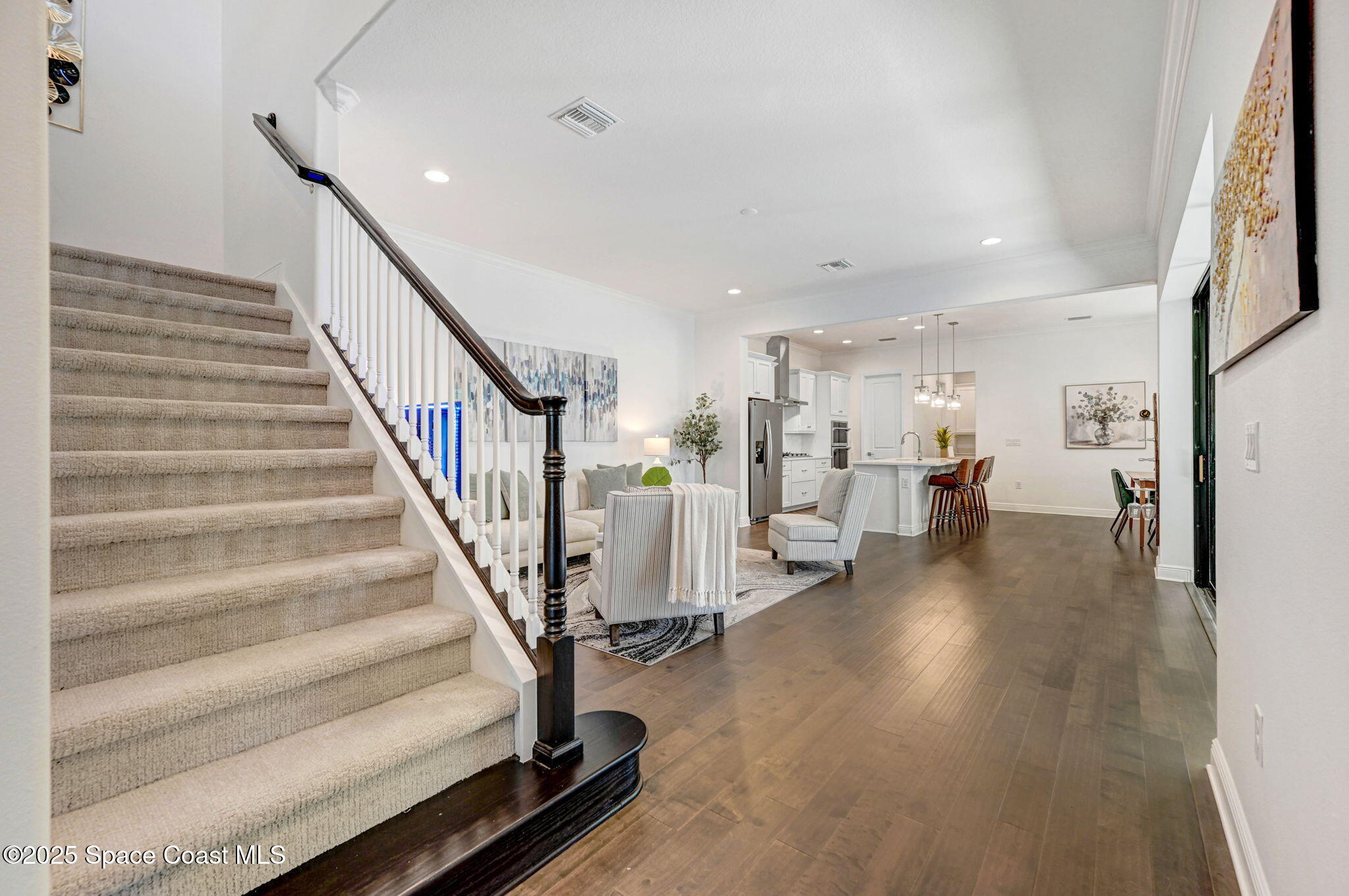 2366 Addison Drive Melbourne, FL 32940 - Photo 22 of 43 a view of entryway and hall with wooden floor