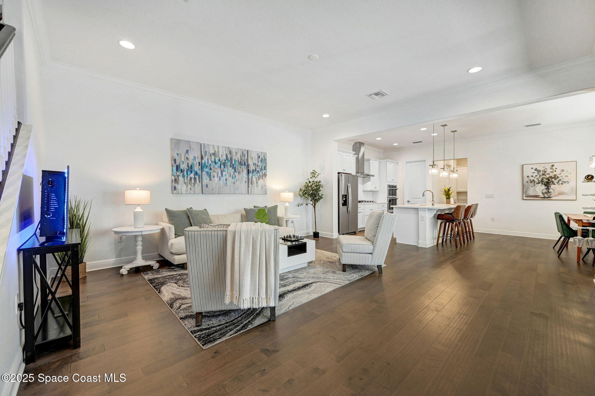 2366 Addison Drive Melbourne, FL 32940 - Photo 23 of 43 a living room with furniture and a table