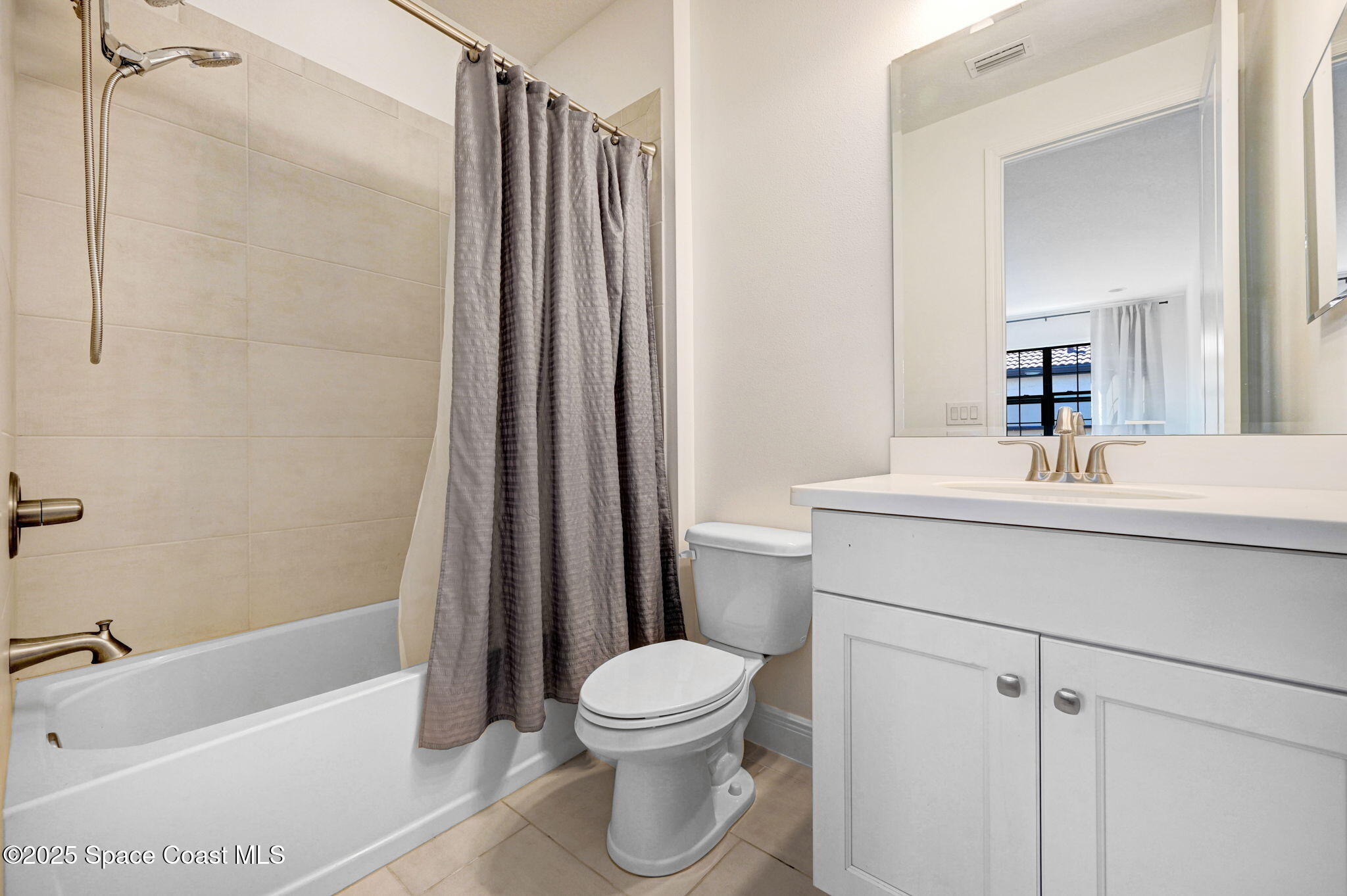 2366 Addison Drive Melbourne, FL 32940 - Photo 40 of 43 a bathroom with a sink a toilet and shower