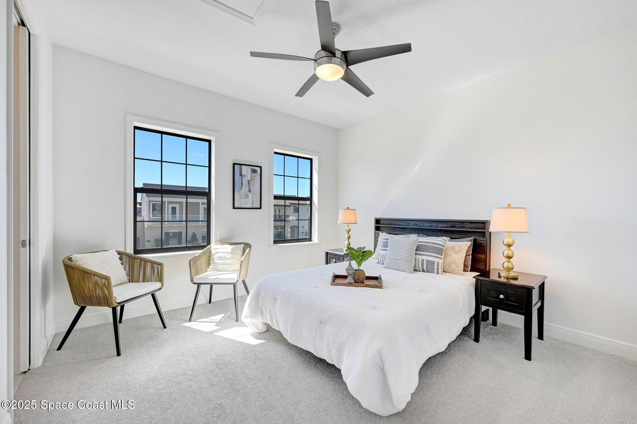 2366 Addison Drive Melbourne, FL 32940 - Photo 42 of 43 a bed room with a bed and a chair