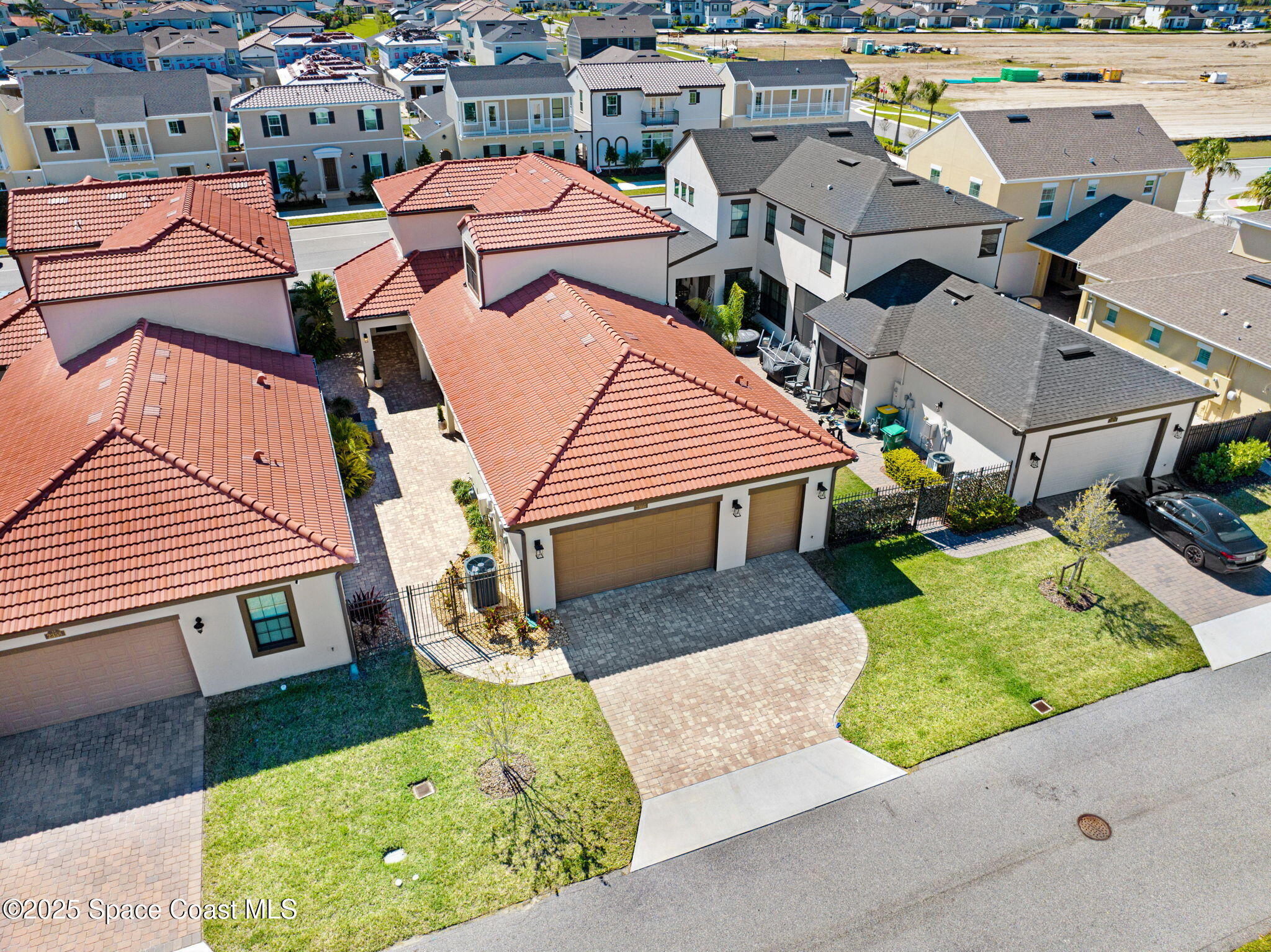 2366 Addison Drive Melbourne, FL 32940 - Photo 8 of 43 an aerial view of a house with a yard and staircase