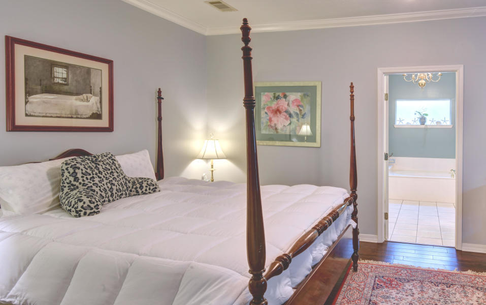 60 West Harborview Road Santa Rosa Beach, FL 32459 - Photo 14 of 17 a bedroom with a bed and a painting on the wall