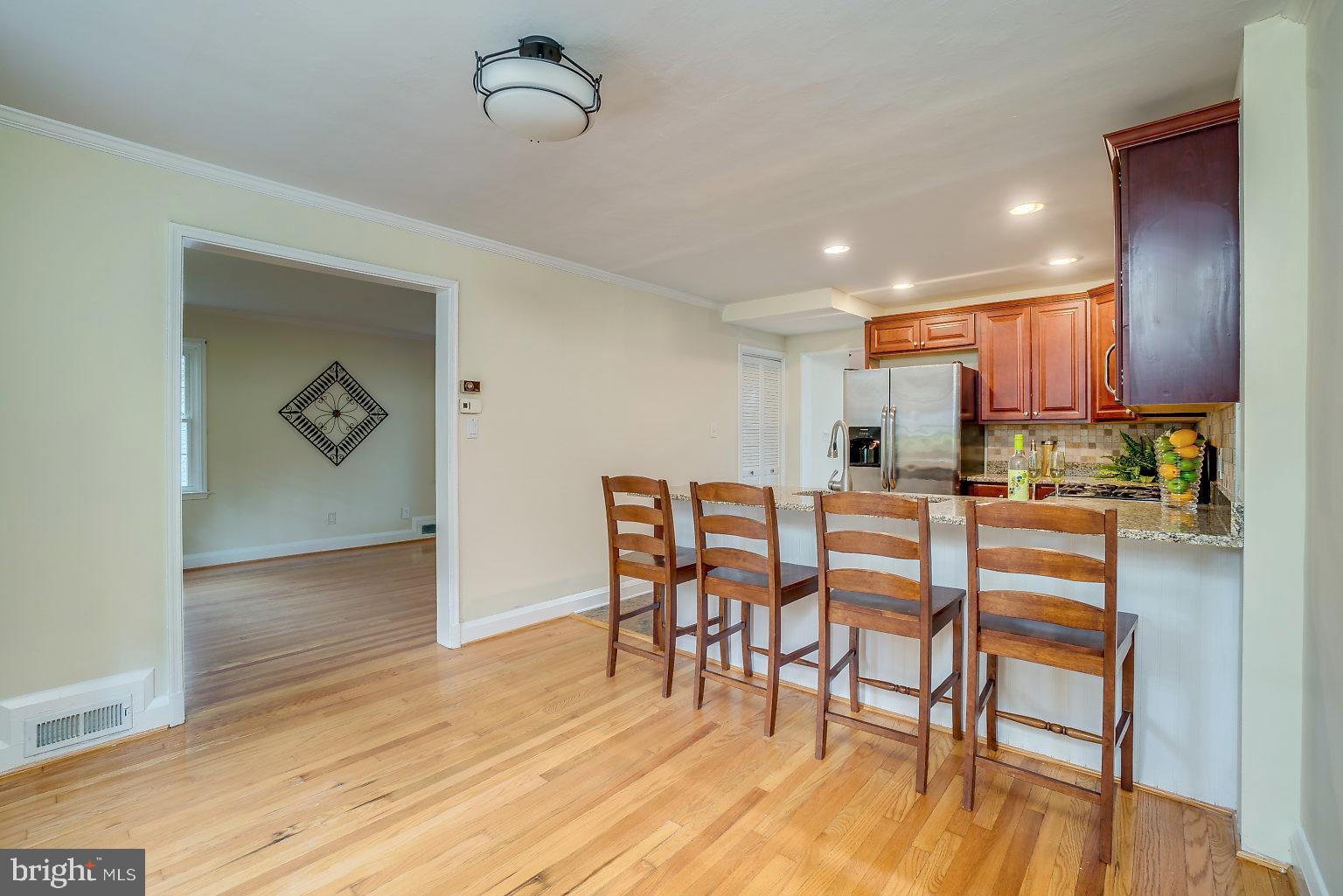 604 Carysbrook Road Baltimore, MD 21208 - Photo 8 of 38 Dining room and combined kitchen area