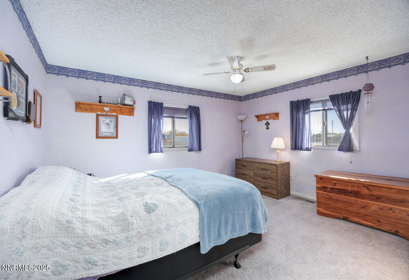 3395 Duane Drive Fallon, NV 89406 - Photo 12 of 22 a bedroom with bed and window