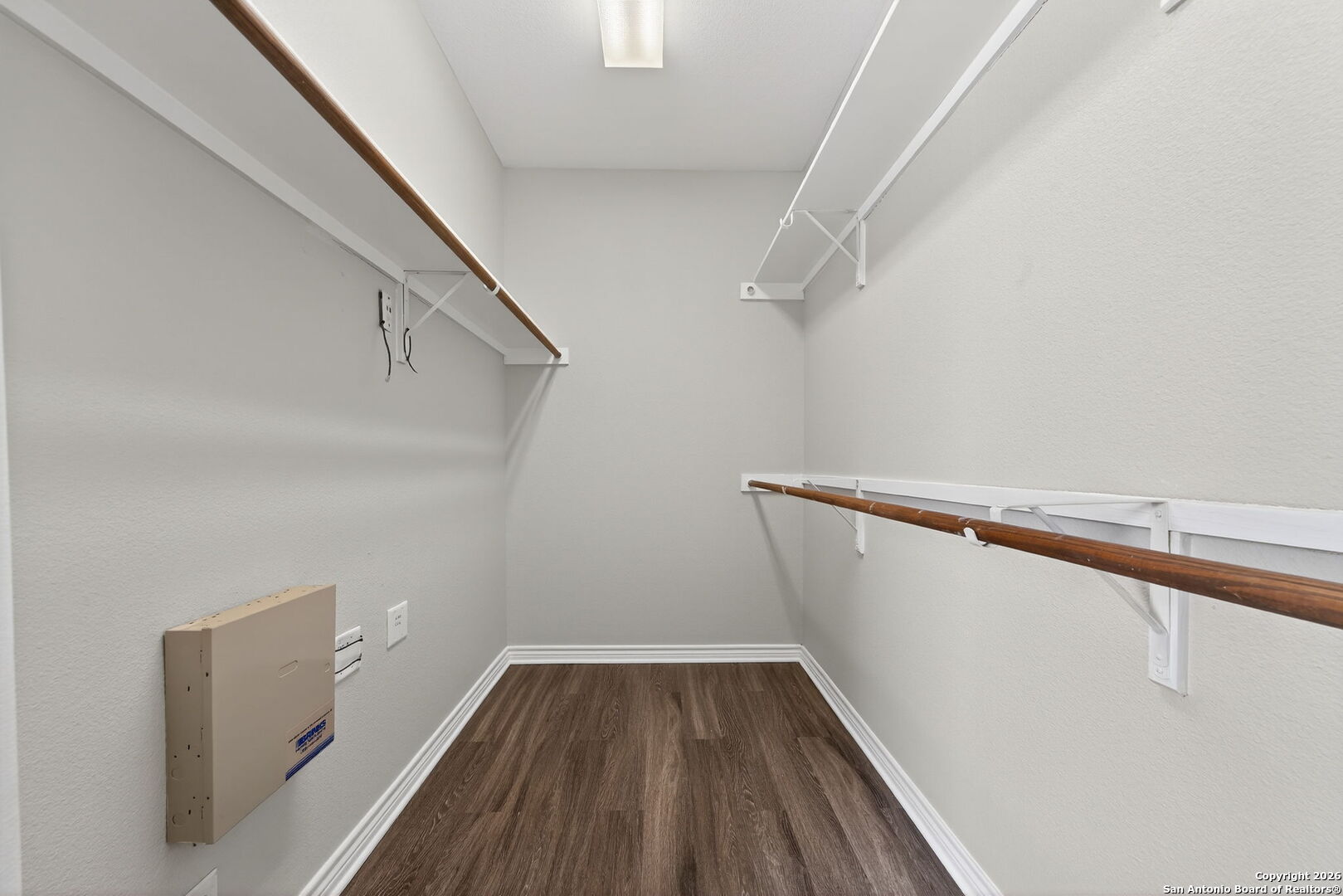 15709 Fair Lane Selma, TX 78154 - Photo 20 of 32 a view of a room with wooden floor and white walls