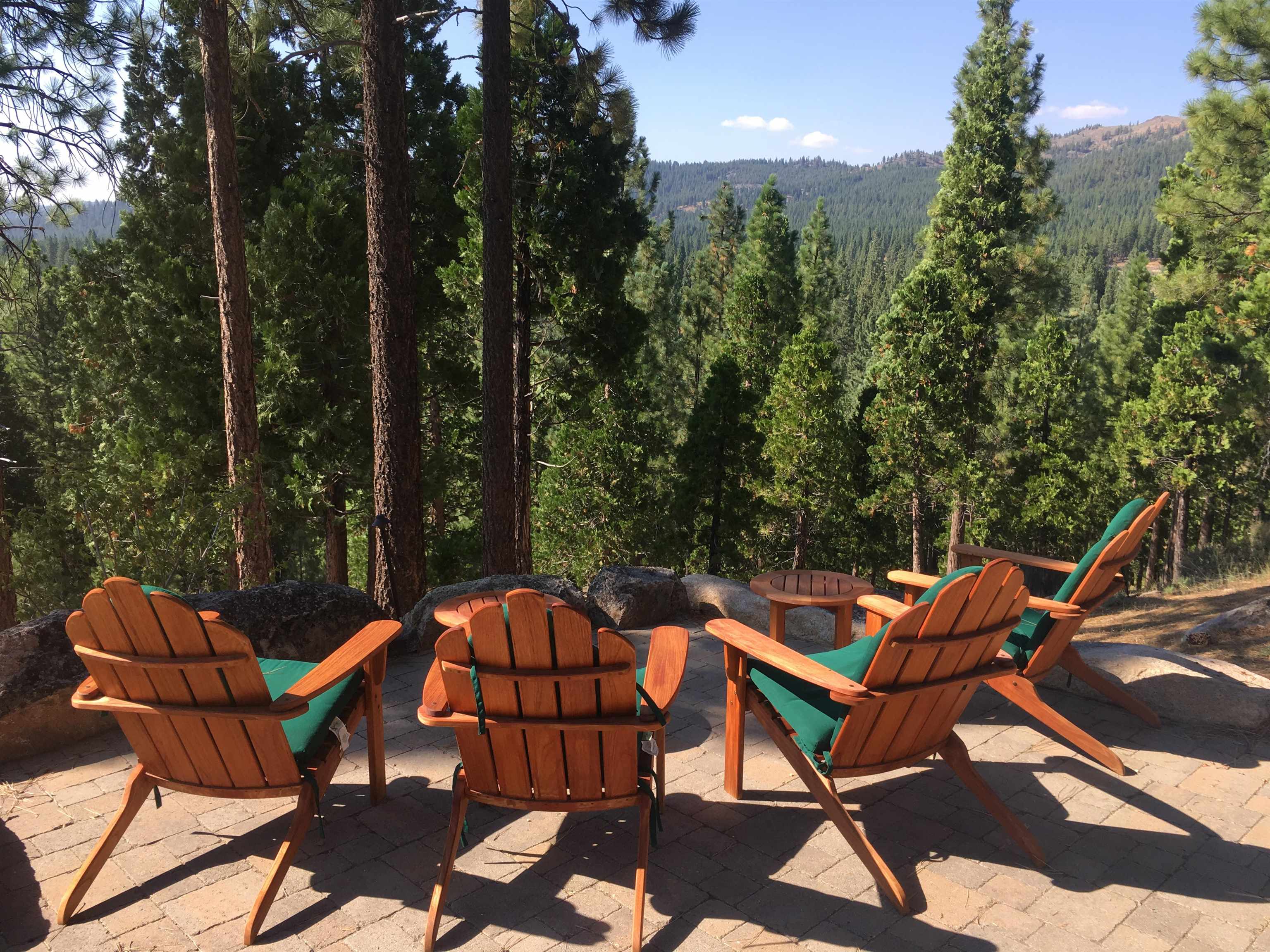 300 Grizzly Ranch Road Portola, CA 96122 - Photo 9 of 9 an outdoor sitting area with chairs and wooden fence