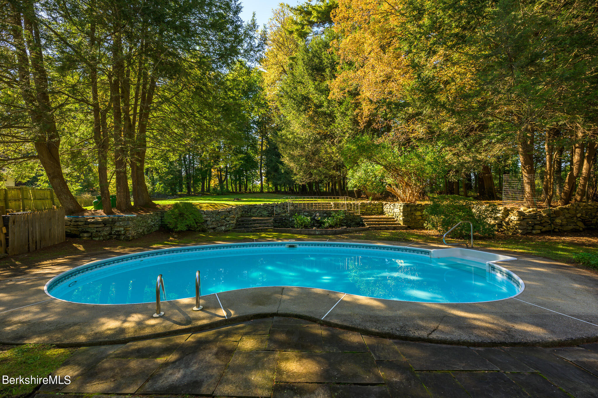 2 Cherry Street Stockbridge, MA 01262 - Photo 11 of 42 a view of a swimming pool with an outdoor seating