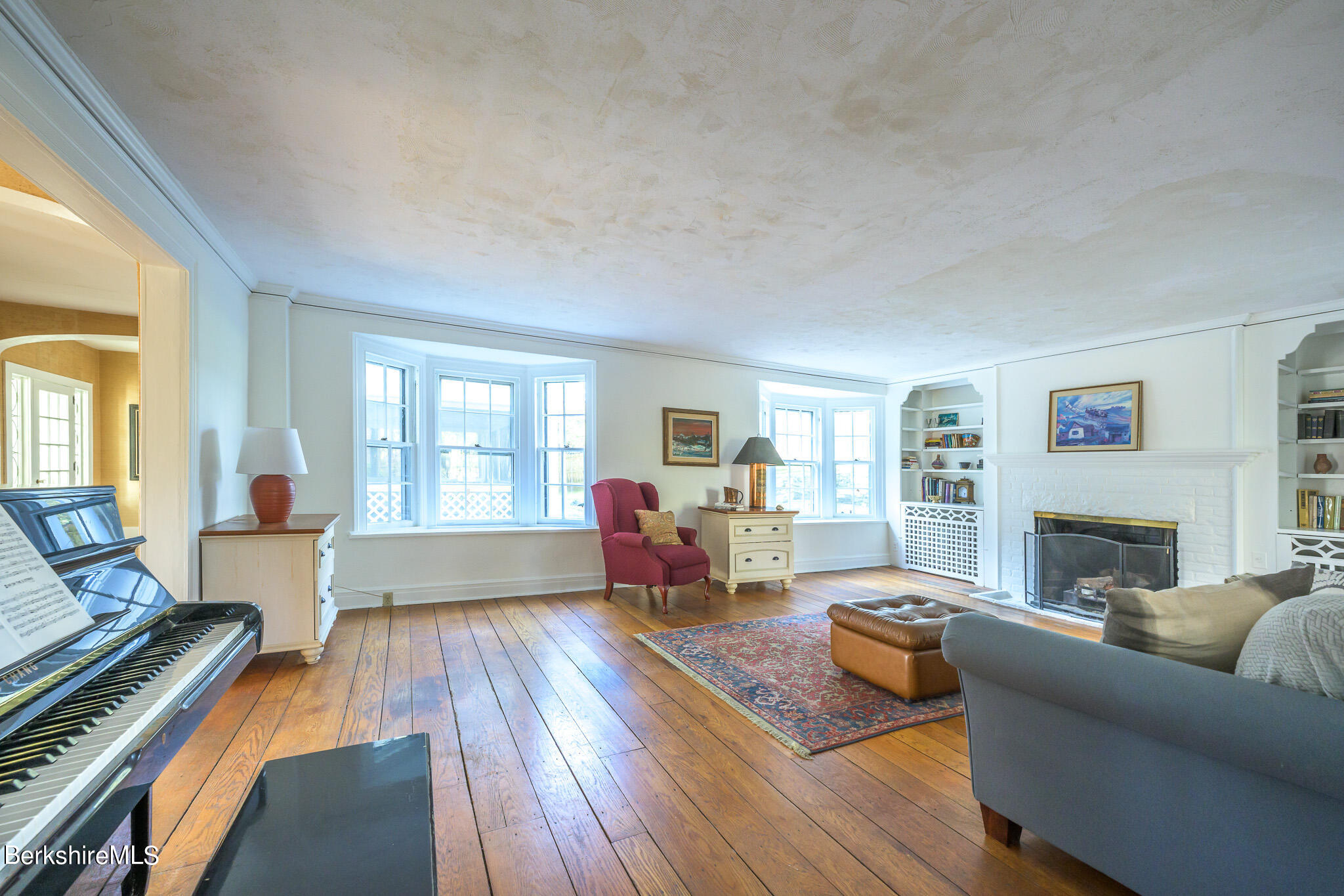 2 Cherry Street Stockbridge, MA 01262 - Photo 13 of 42 a living room with furniture and a fireplace