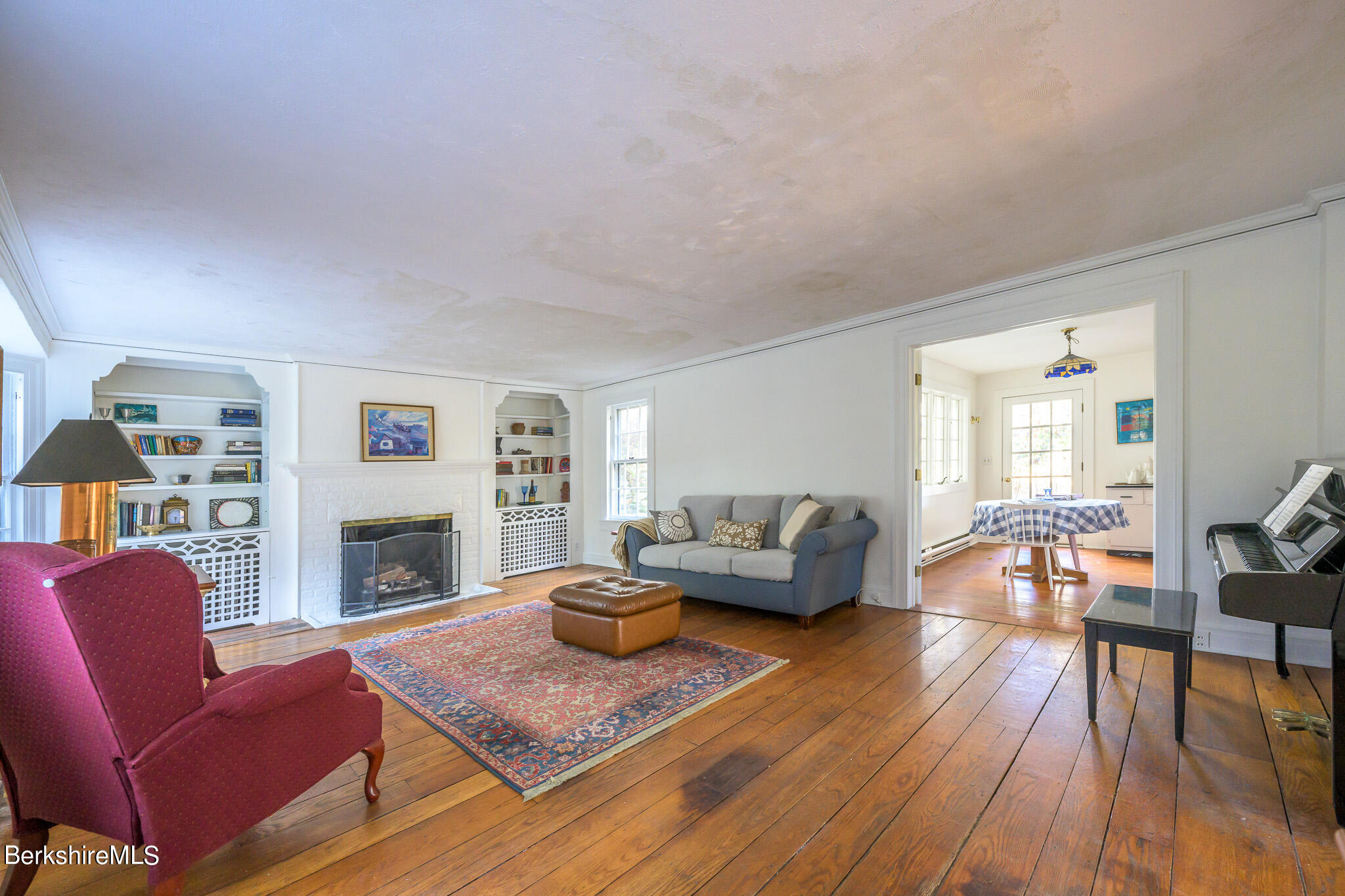 2 Cherry Street Stockbridge, MA 01262 - Photo 15 of 42 a living room with furniture and a fireplace