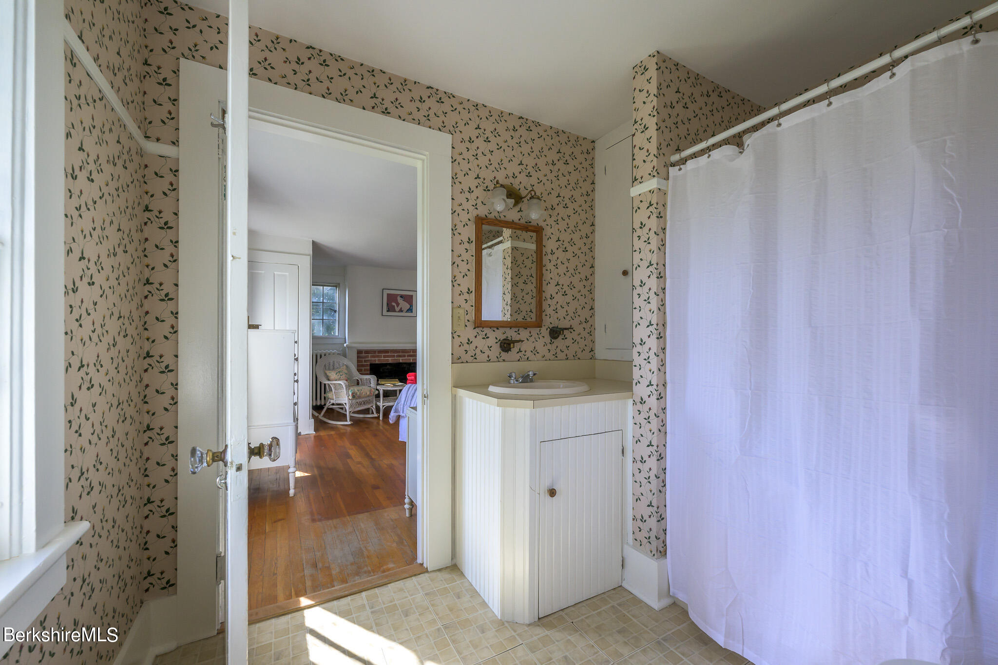 2 Cherry Street Stockbridge, MA 01262 - Photo 26 of 42 a bathroom with a granite countertop sink a mirror and shower