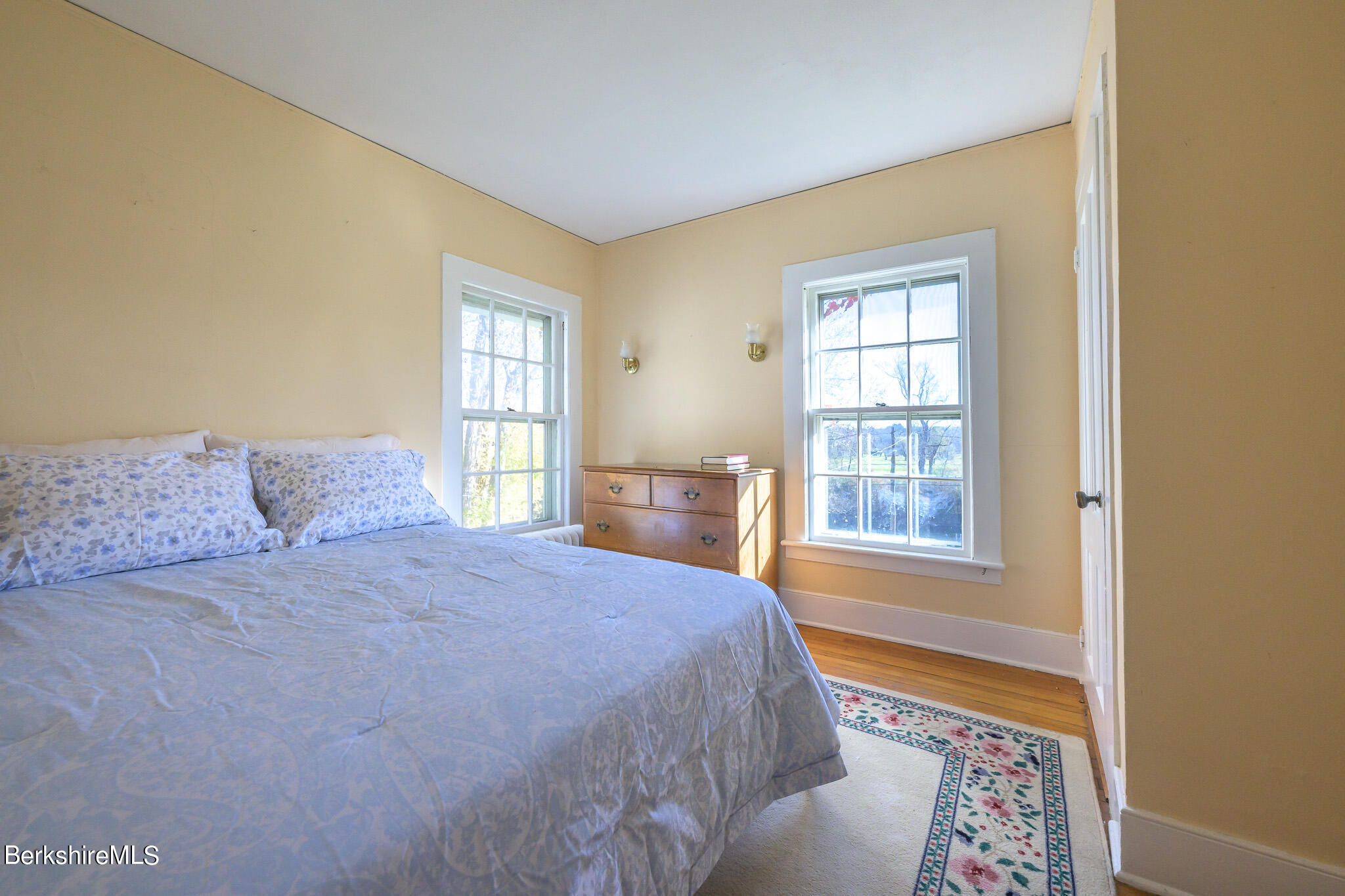 2 Cherry Street Stockbridge, MA 01262 - Photo 30 of 42 a bedroom with a bed and a window