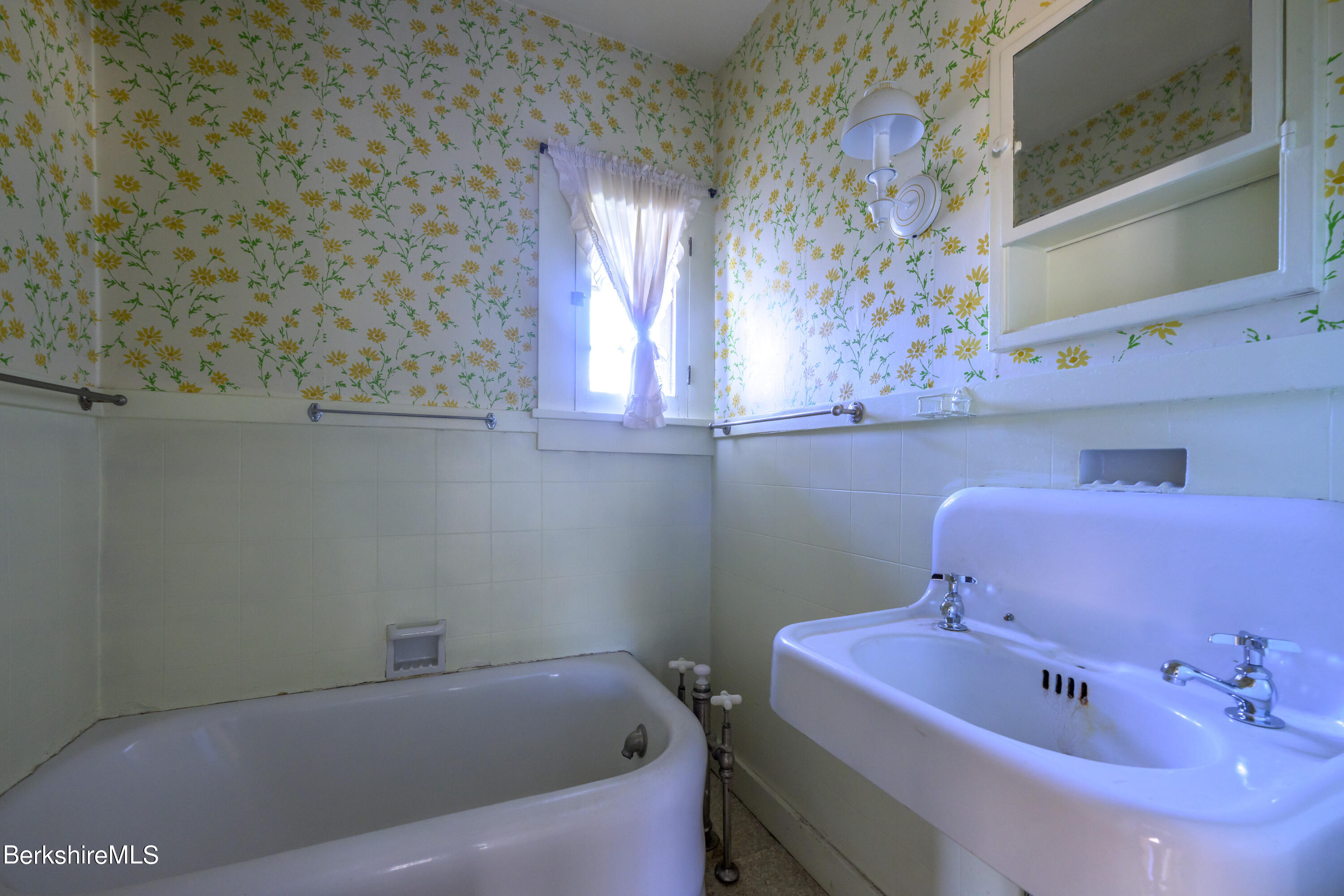2 Cherry Street Stockbridge, MA 01262 - Photo 36 of 42 a bathroom with a sink and a bathtub