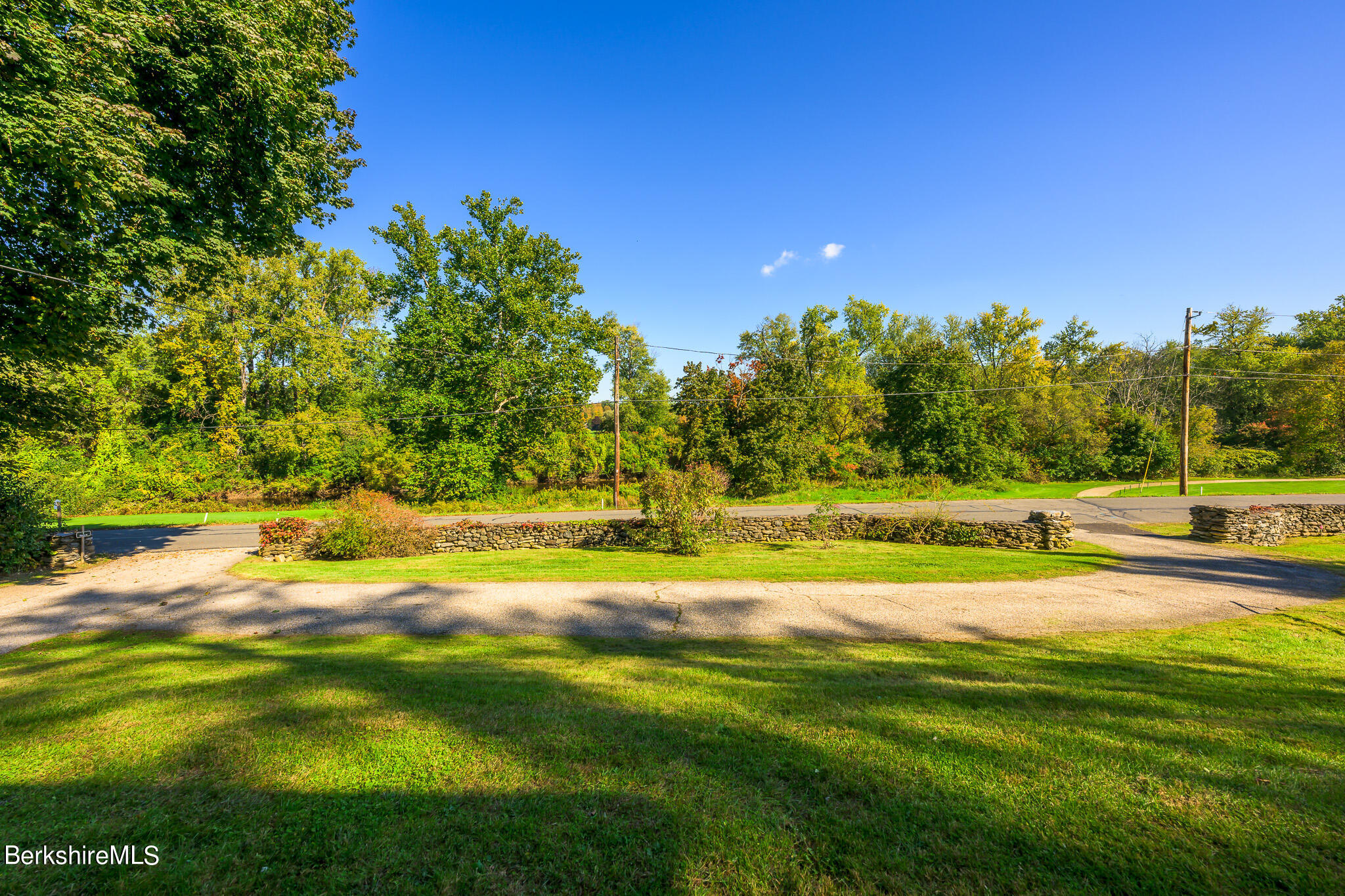2 Cherry Street Stockbridge, MA 01262 - Photo 42 of 42 a view of a yard with a house