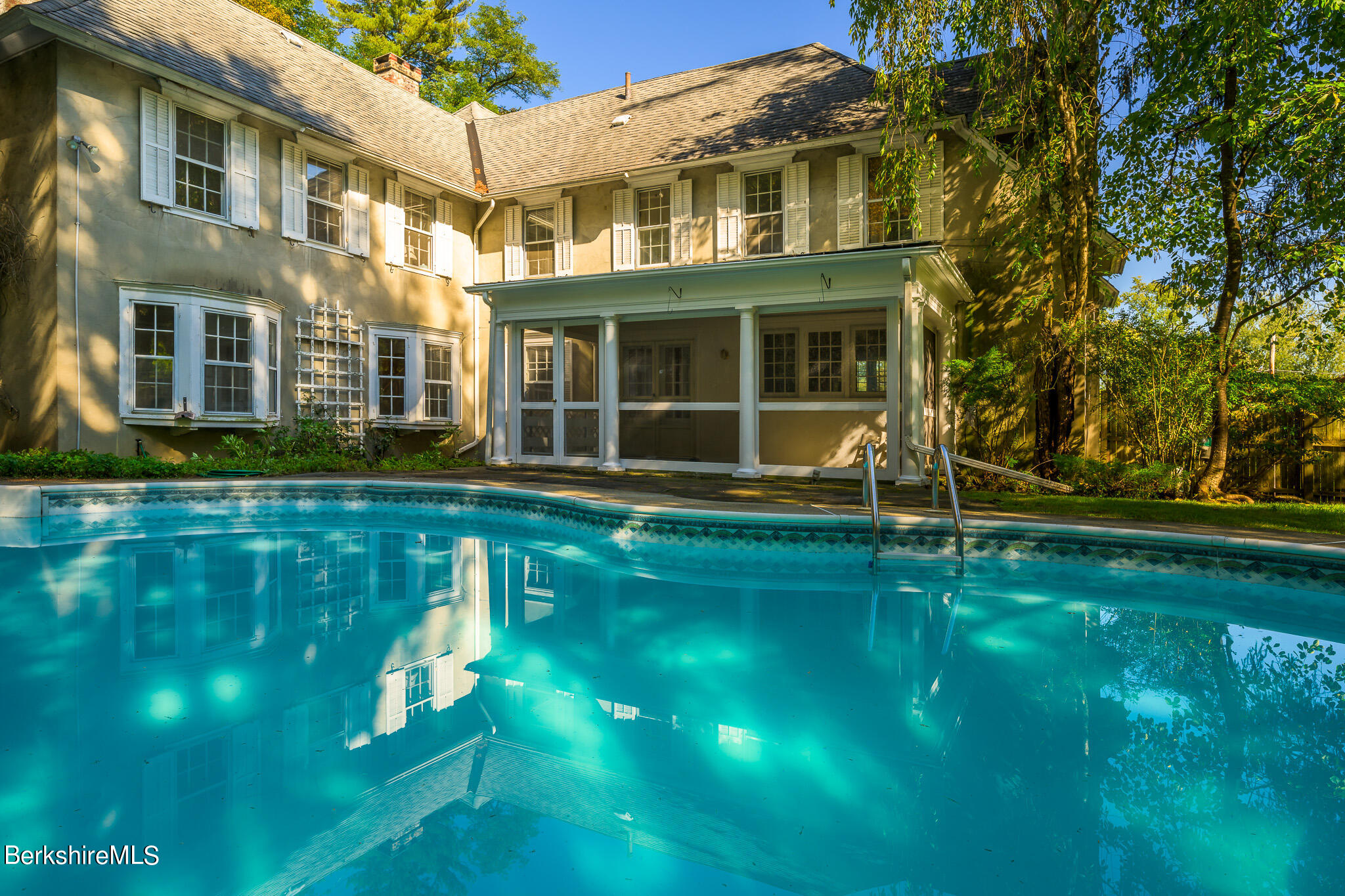 2 Cherry Street Stockbridge, MA 01262 - Photo 9 of 42 a front view of a house with a yard