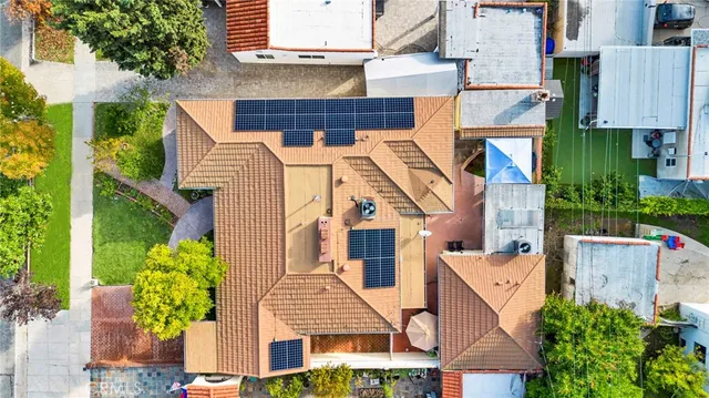 front view of a house with a garden