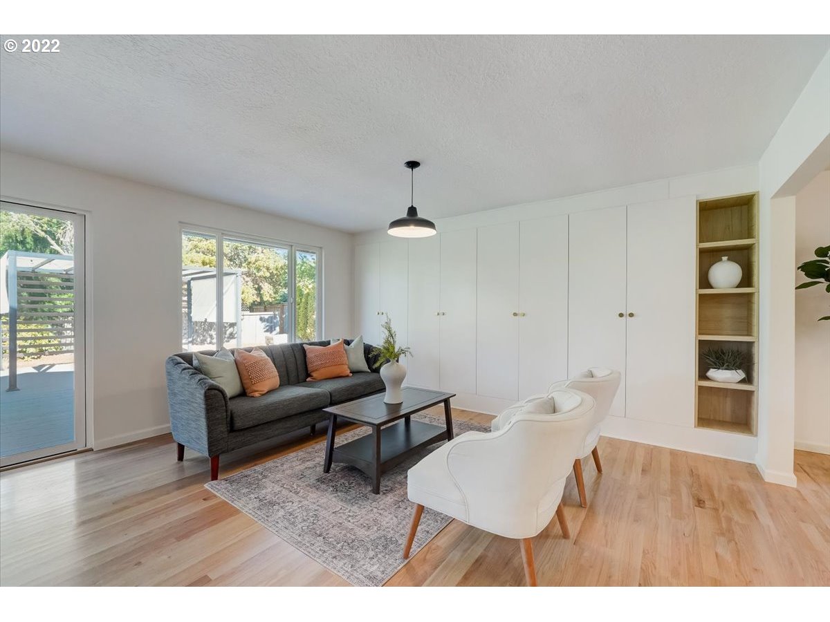 15645 Northwest Perimeter Drive Beaverton, OR 97006 - Photo 16 of 32 a living room with furniture and a window