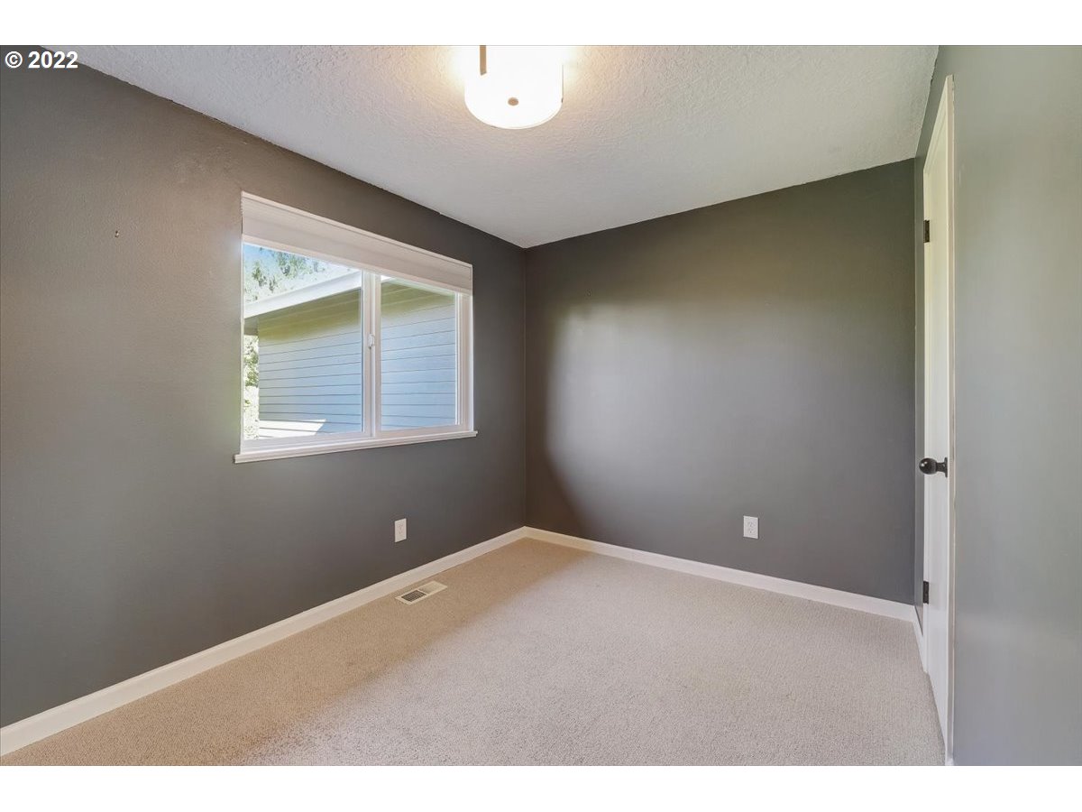 15645 Northwest Perimeter Drive Beaverton, OR 97006 - Photo 25 of 32 a view of an empty room with a window