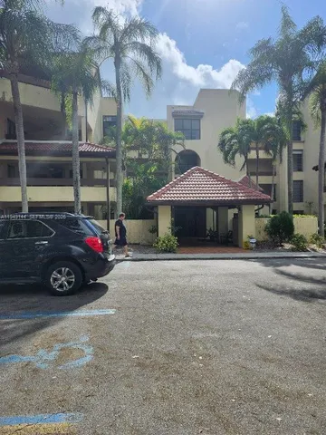 a car parked in front of a house