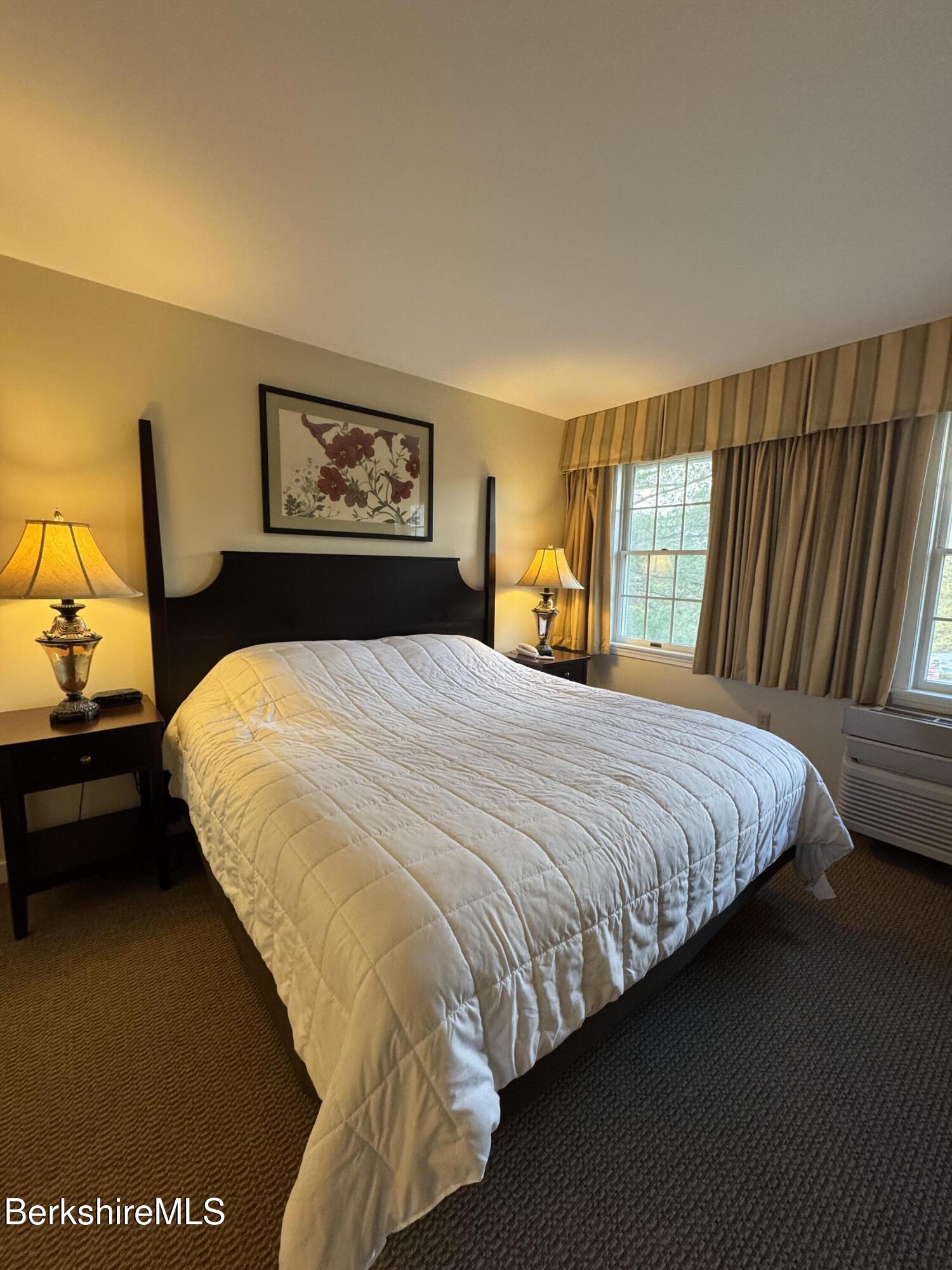 37 Corey Road, Unit 426 Hancock, MA 01237 - Photo 8 of 14 a bedroom with a bed and window