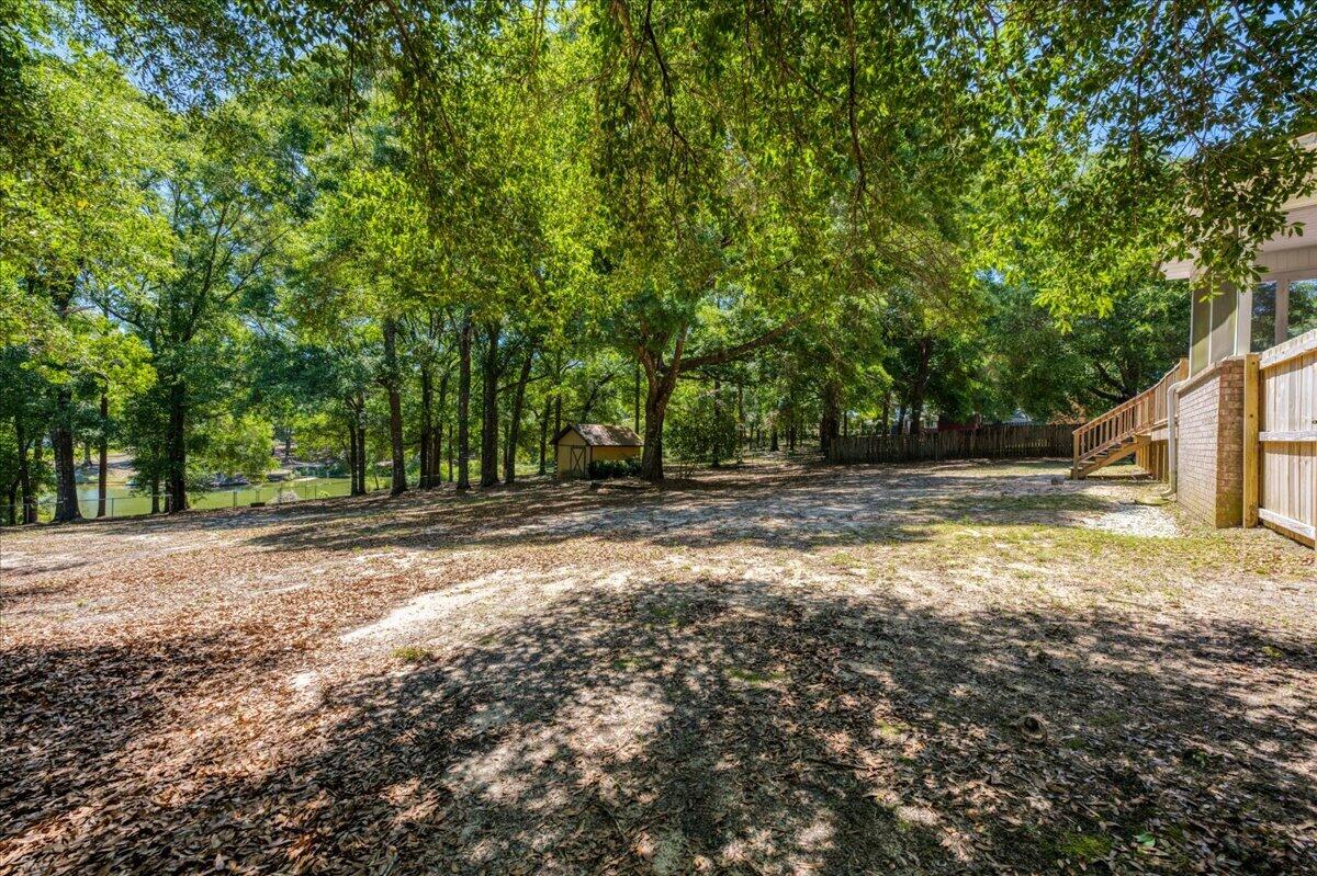 210 Shell Drive Crestview, FL 32536 - Photo 47 of 67 a view of backyard with green space