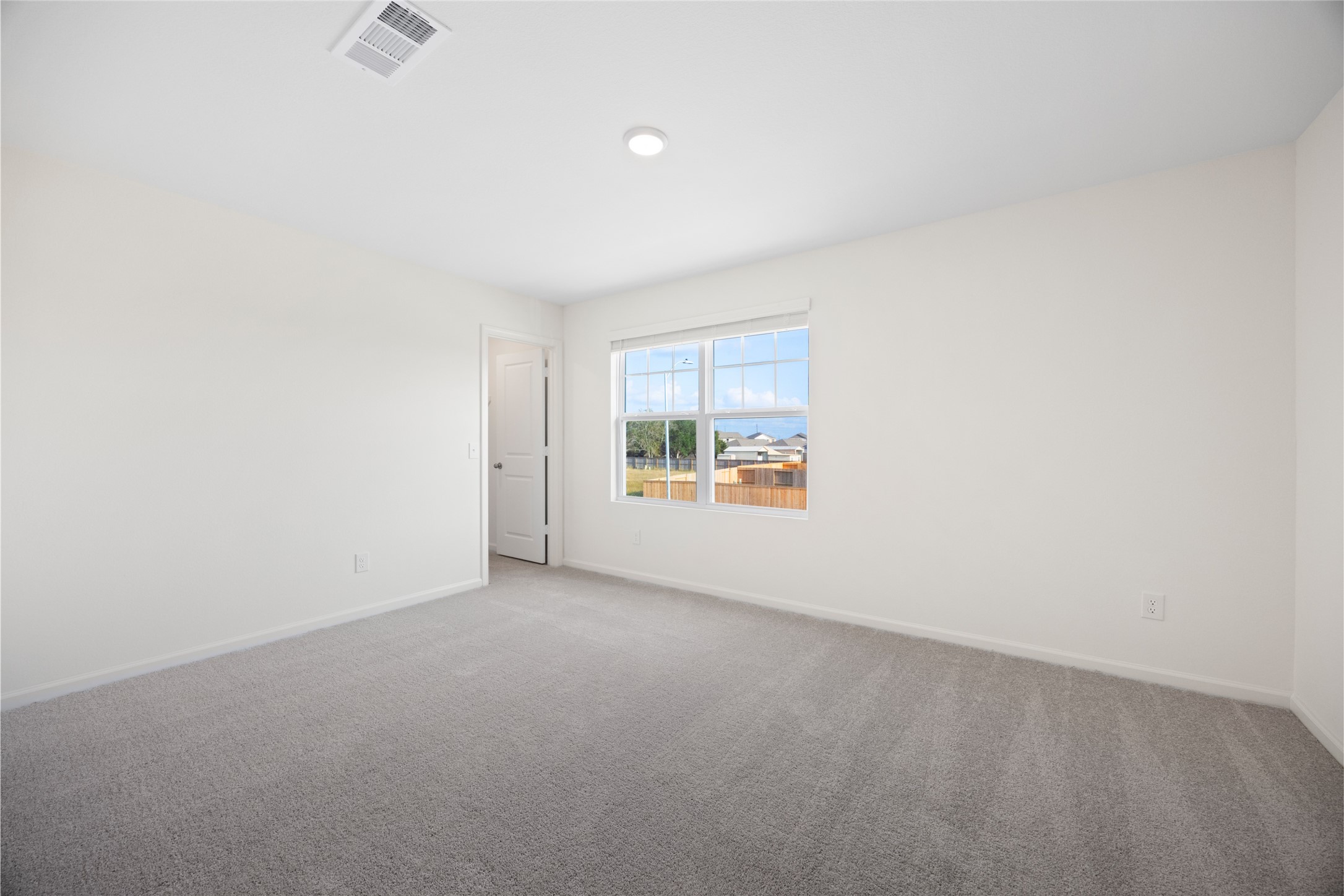 8807 Vacek Xing Way Richmond, TX 77469 - Photo 17 of 33 an empty room with a window