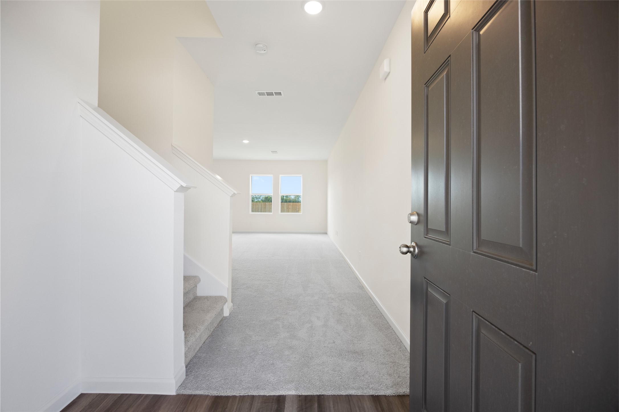 8807 Vacek Xing Way Richmond, TX 77469 - Photo 19 of 33 wooden floor in an empty room