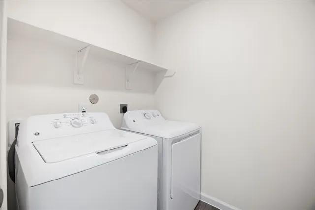a utility room with dryer and washer