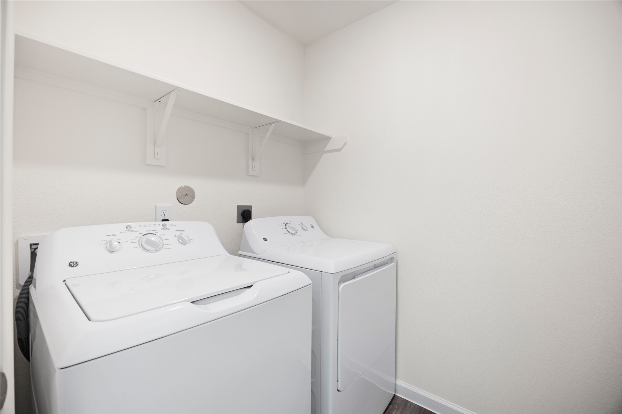8807 Vacek Xing Way Richmond, TX 77469 - Photo 20 of 33 a utility room with dryer and washer