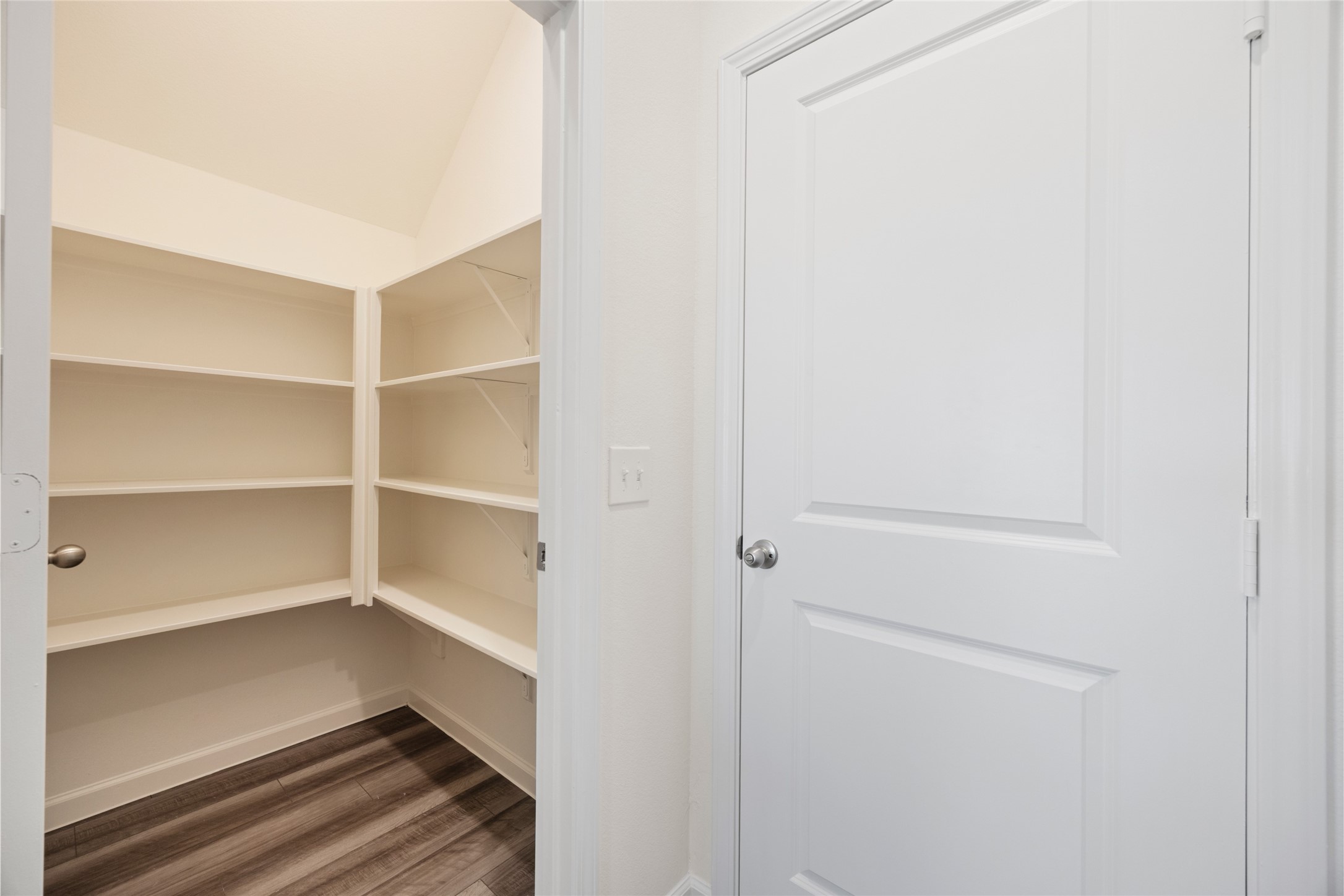 8807 Vacek Xing Way Richmond, TX 77469 - Photo 24 of 33 a view of walk in closet with empty racks