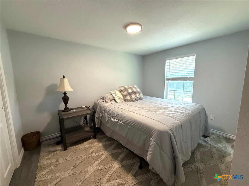 8 Marshall Road Port Lavaca, TX 77979 - Photo 15 of 31 a bedroom with a bed and a window