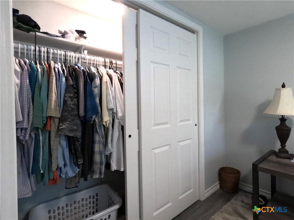 8 Marshall Road Port Lavaca, TX 77979 - Photo 17 of 31 a view of walk in closet with clothes and shoes