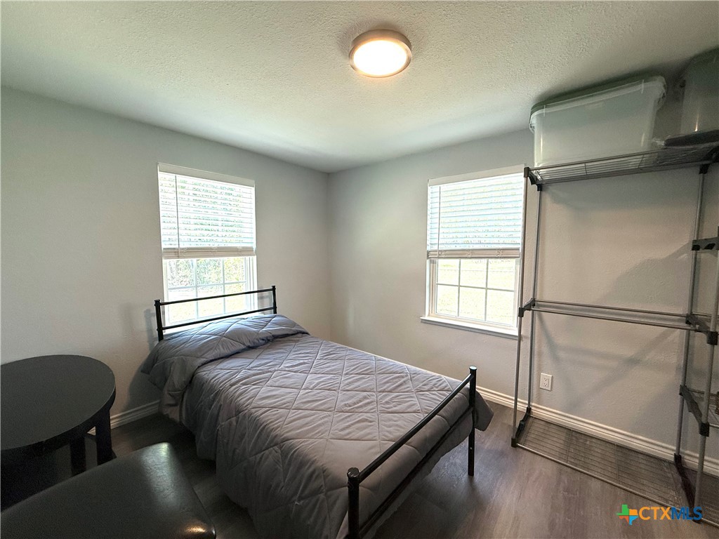 8 Marshall Road Port Lavaca, TX 77979 - Photo 23 of 31 a bedroom with a bed and a window