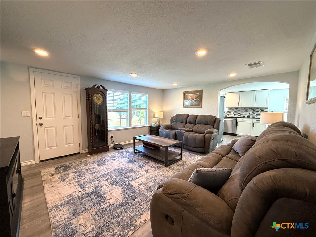 8 Marshall Road Port Lavaca, TX 77979 - Photo 7 of 31 a living room with furniture window and a refrigerator