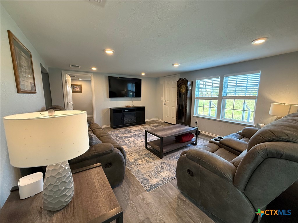 8 Marshall Road Port Lavaca, TX 77979 - Photo 8 of 31 a living room with furniture and a flat screen tv