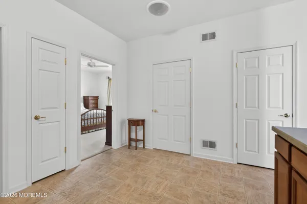 a view of livingroom with furniture and closet area