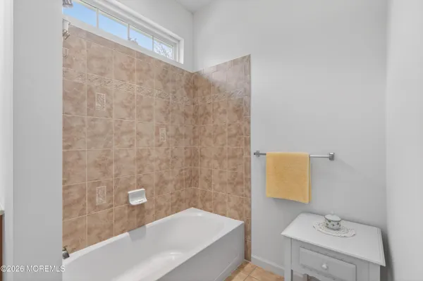 a bathroom with a sink and a tub
