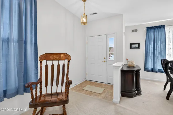 a room with furniture and a window