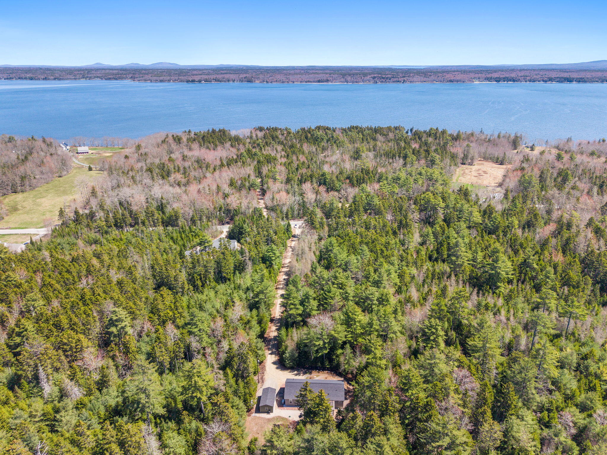 811 Newbury Neck Road Surry, ME 04684 - Photo 2 of 47 5-web-or-mls-DJI_20260428120502_0559_D