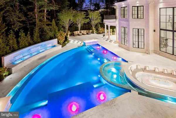 a living room with couches and painted walls