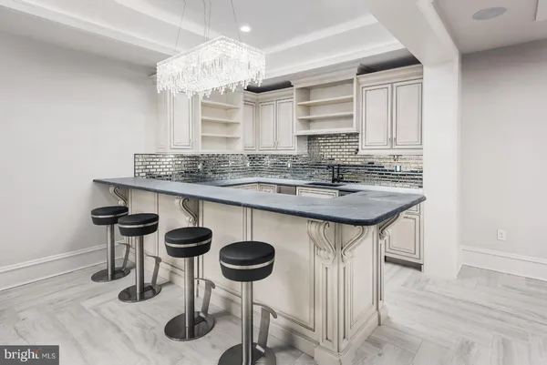 a view of yard with swimming pool and sitting area