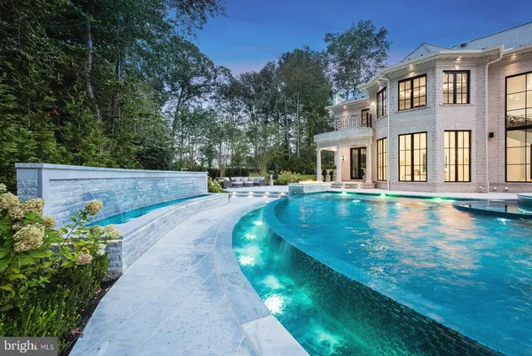 a view of a living room and entry way
