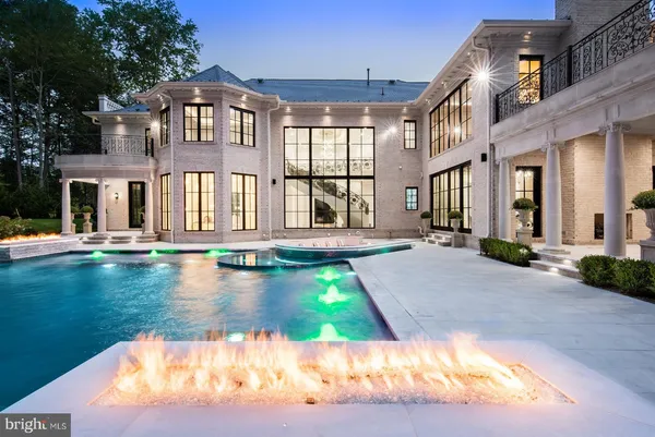 a kitchen with stainless steel appliances granite countertop a stove and a refrigerator