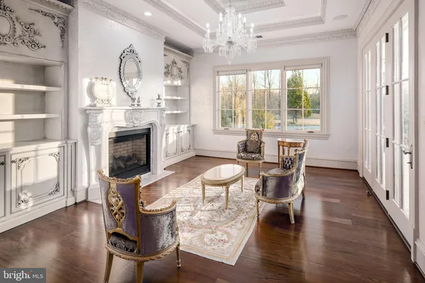 a bed sitting in a room next to a window