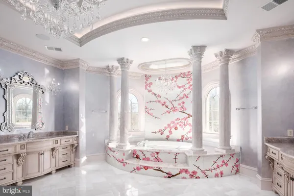 a bedroom with a bed and a fireplace