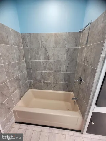 a bathroom with a bathtub