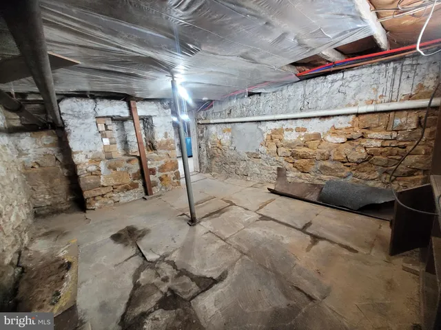 a view of a glass door shower and toilet